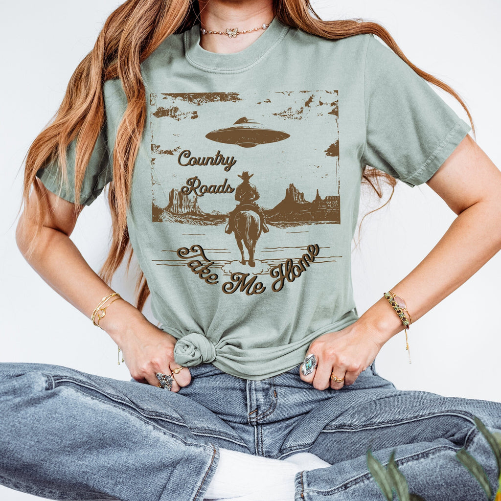 Country Roads Take Me Home graphic shirt featuring Cowboy UFO Western Graphic Tee