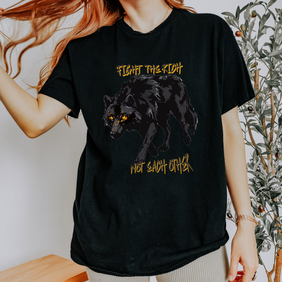 Fight the Rich Not Each Other graphic shirt featuring Anti-Oligarchy Wolf Graphic Tee