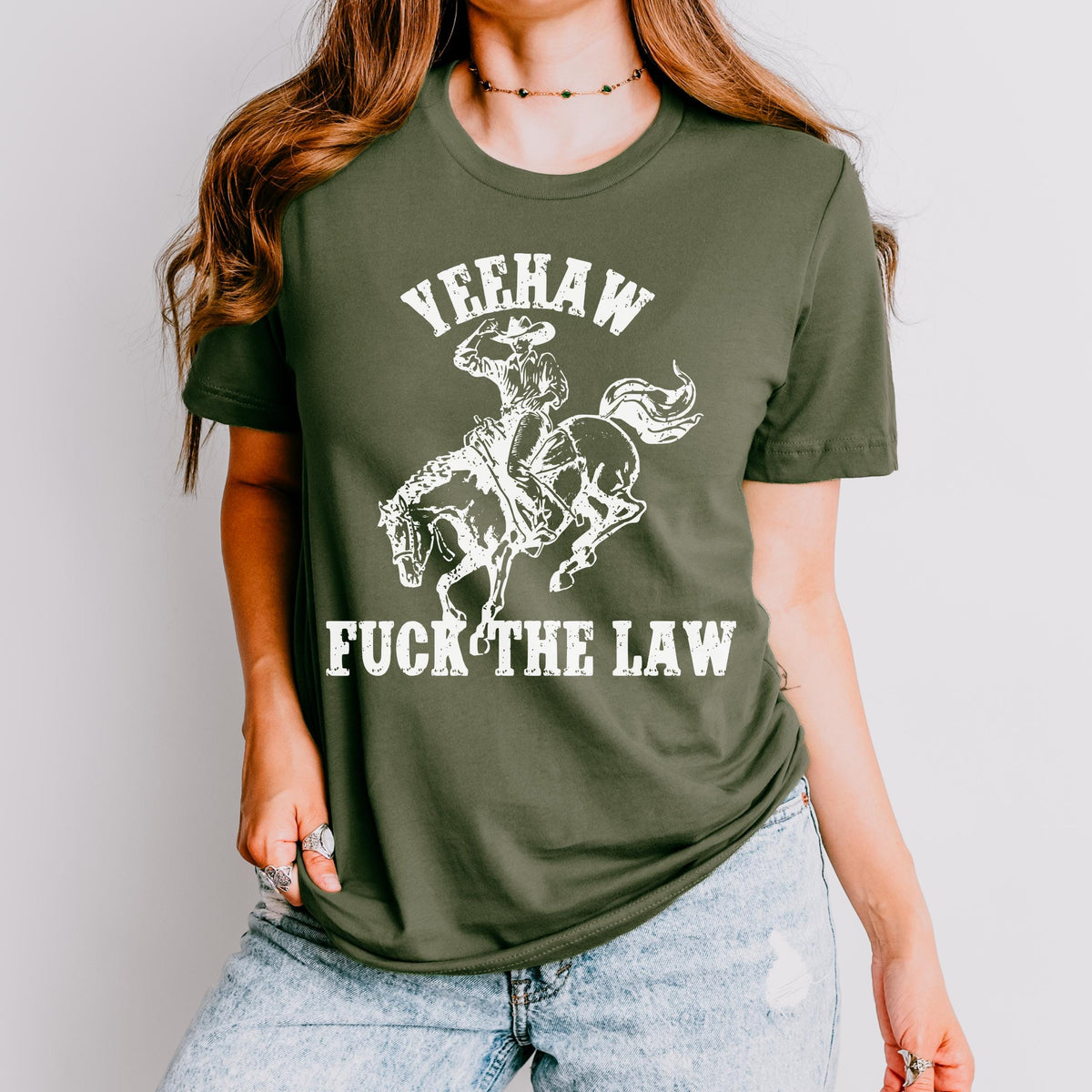 Yeehaw Fuck the Law graphic shirt featuring Outlaw Cowboy Western Graphic Tee