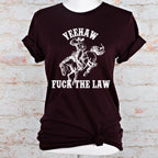 Yeehaw Fuck the Law graphic shirt featuring Outlaw Cowboy Western Graphic Tee