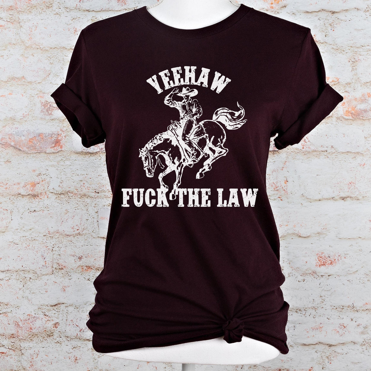 Yeehaw Fuck the Law graphic shirt featuring Outlaw Cowboy Western Graphic Tee
