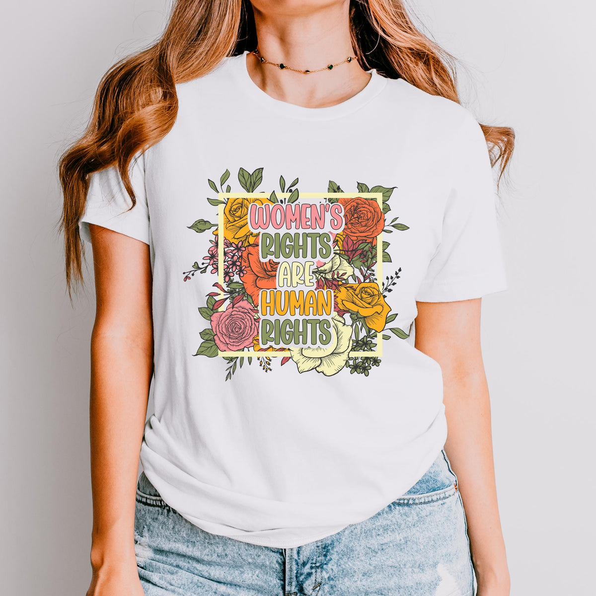 Women’s Rights Are Human Rights graphic shirt featuring Retro Floral Feminist Tee