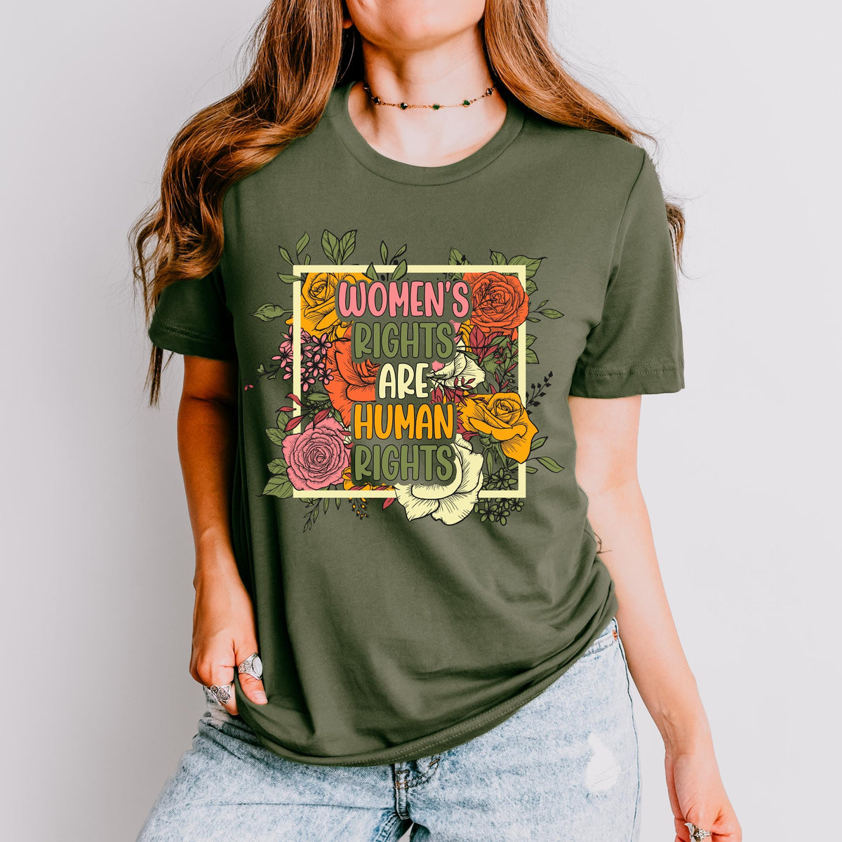 Women’s Rights Are Human Rights graphic shirt featuring Retro Floral Feminist Tee