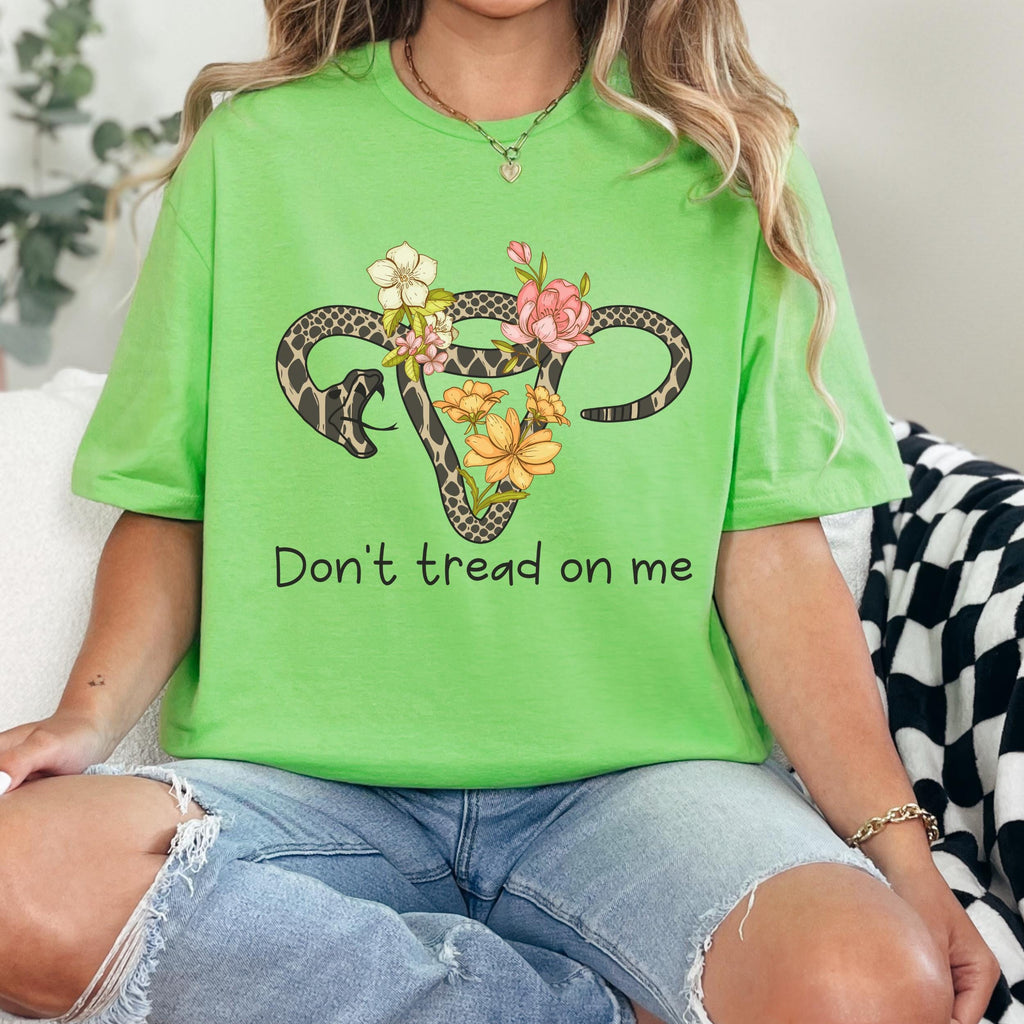 Don’t Tread on Me graphic shirt featuring Feminist Snake Uterus Graphic Tee
