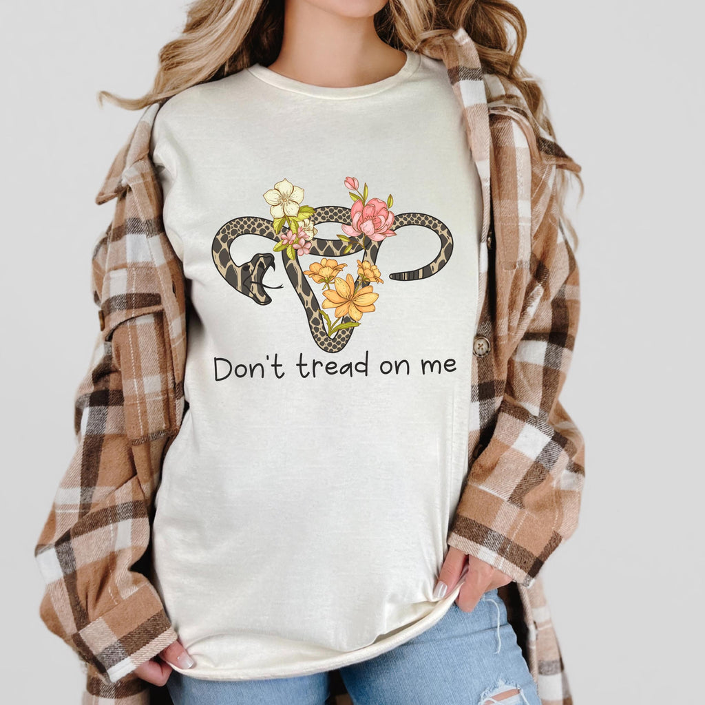 Don’t Tread on Me graphic shirt featuring Feminist Snake Uterus Graphic Tee