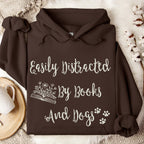 Easily Distracted by Books and Dogs graphic hoodie featuring Book Lover Dog Mom Sweatshirt