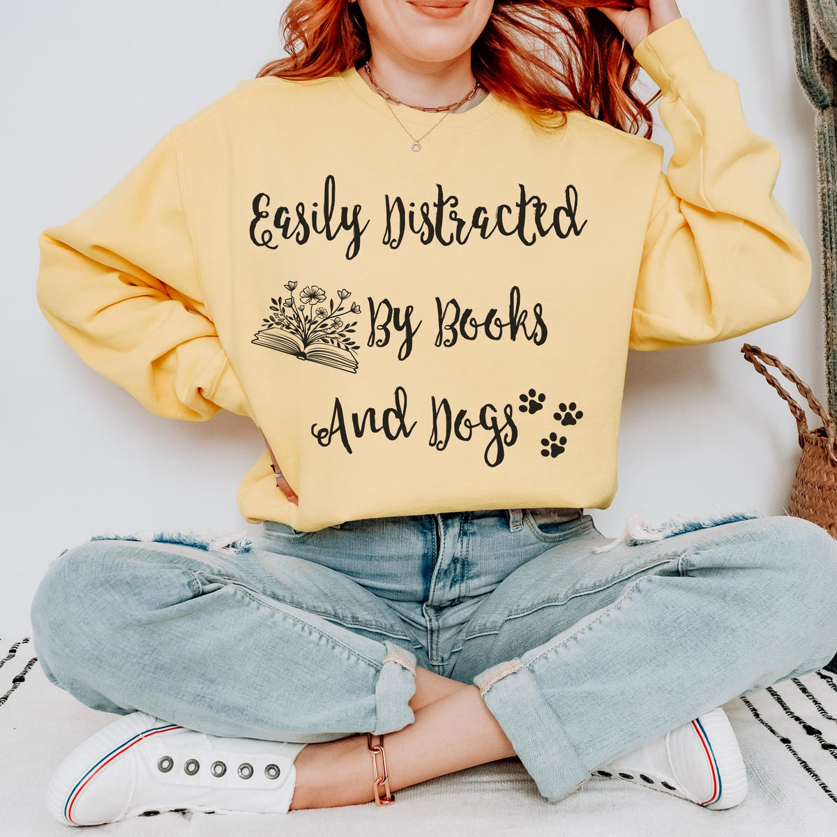 Easily Distracted by Books and Dogs graphic sweatshirt featuring Book Lover Dog Crewneck