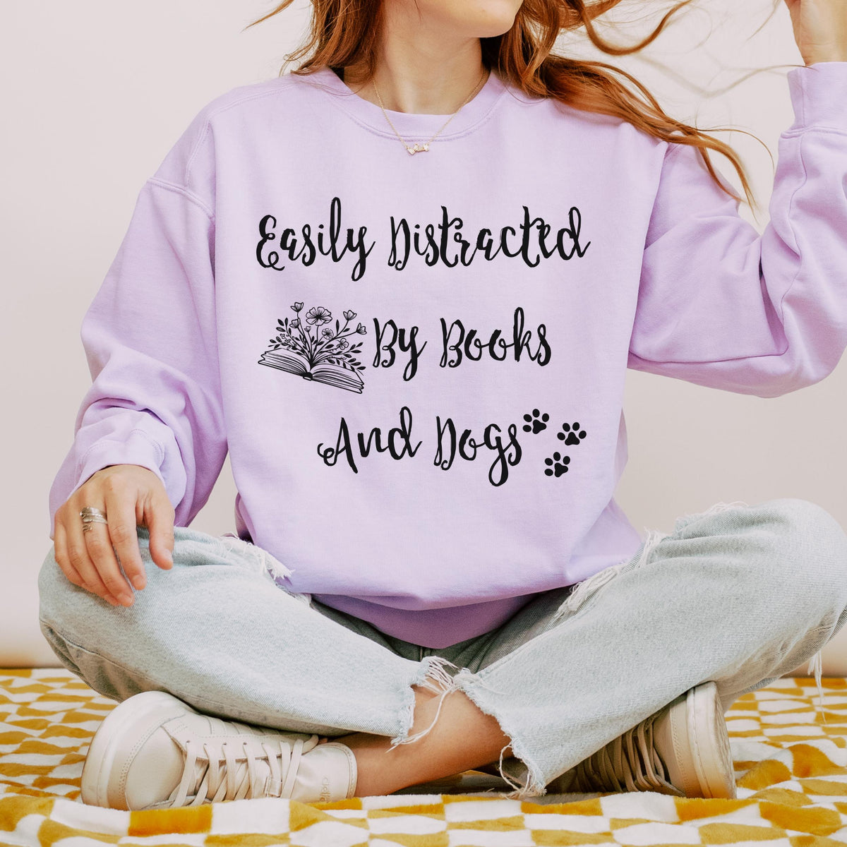 Easily Distracted by Books and Dogs graphic sweatshirt featuring Book Lover Dog Crewneck
