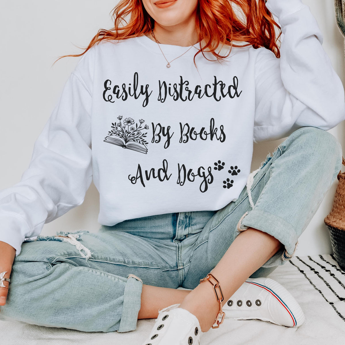 Easily Distracted by Books and Dogs graphic sweatshirt featuring Book Lover Dog Crewneck