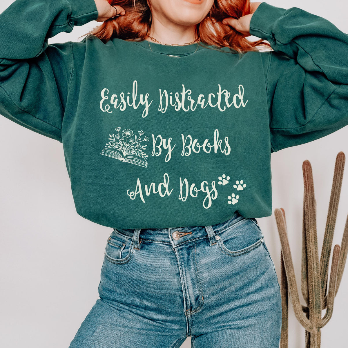 Easily Distracted by Books and Dogs graphic sweatshirt featuring Book Lover Dog Crewneck in Blue Spruce