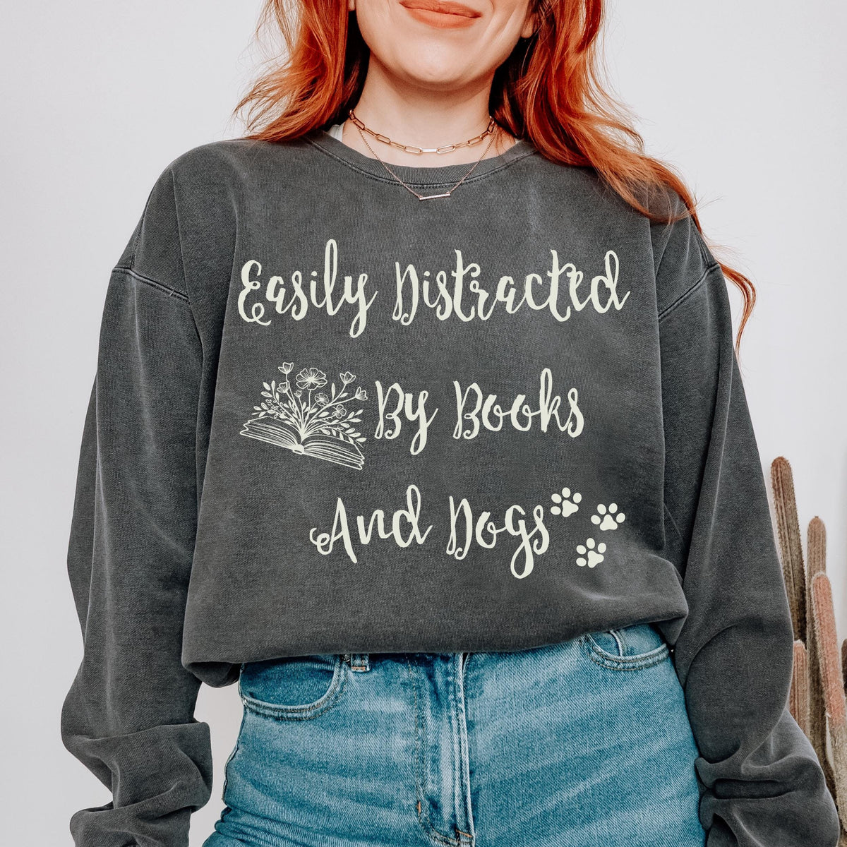 Easily Distracted by Books and Dogs graphic sweatshirt featuring Book Lover Dog Crewneck