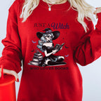 Just a Witch Who Loves Books graphic sweatshirt featuring Witchy Book Lover Crewneck