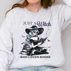 Just a Witch Who Loves Books graphic sweatshirt featuring Witchy Book Lover Crewneck