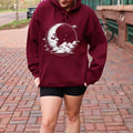 Celestial Moon Face graphic hoodie featuring Witchy Crescent Moon Pullover