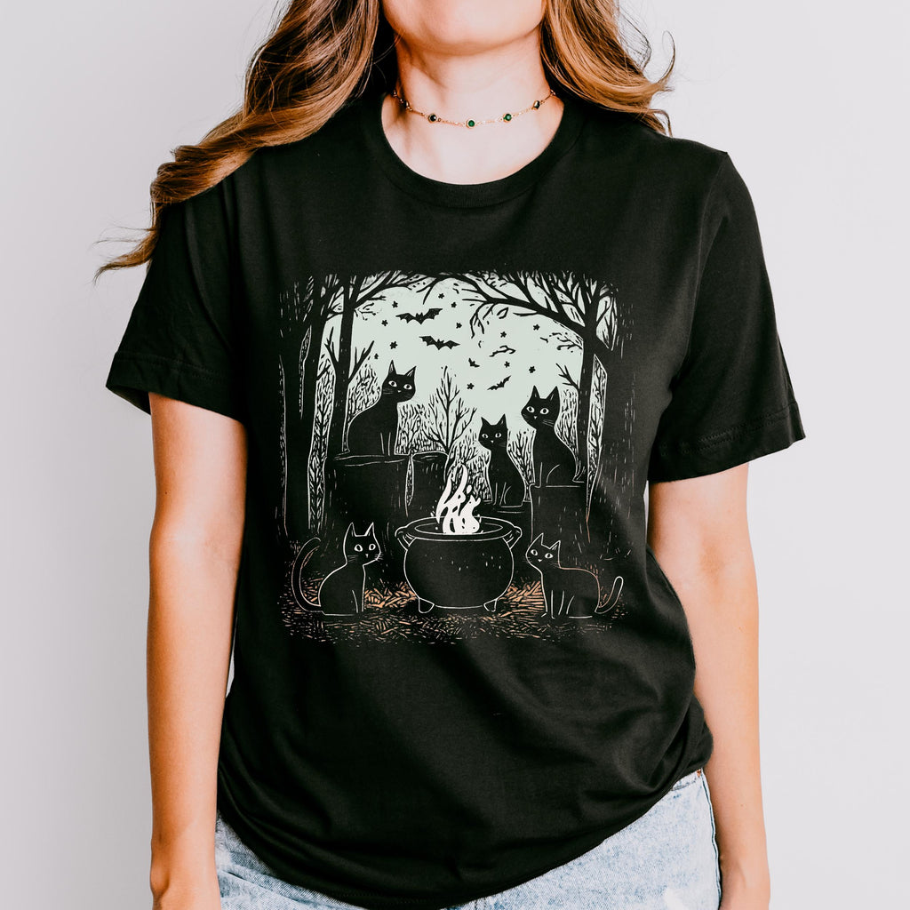 Black Cat Coven graphic shirt featuring Witchy Cat Cauldron Graphic Tee