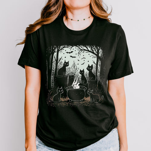 Black Cat Coven graphic shirt featuring Witchy Cat Cauldron Graphic Tee