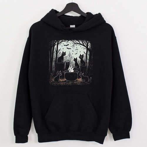 Black Cat Coven graphic hoodie featuring Witchy Cauldron Cat Sweatshirt in Navy