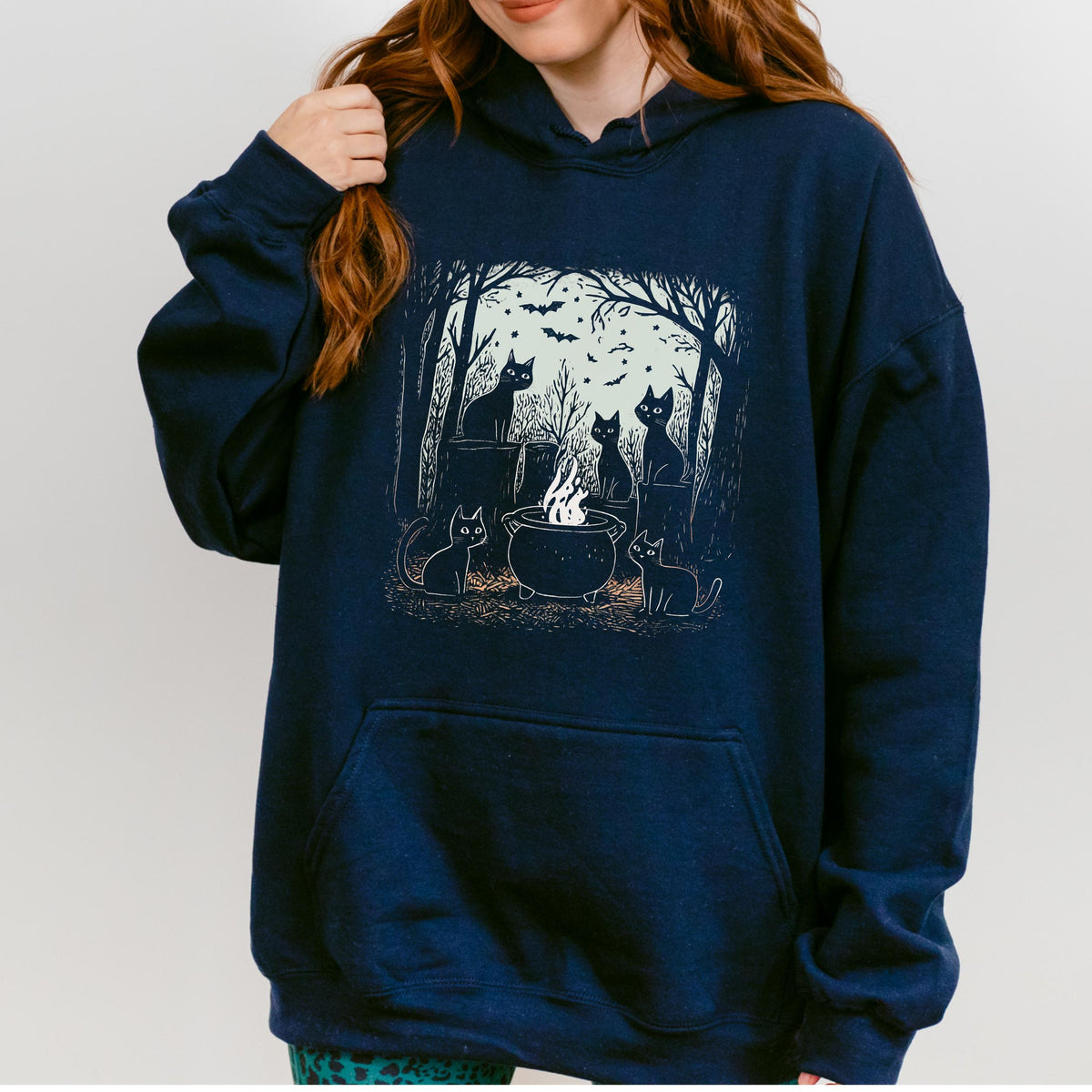 Black Cat Coven graphic hoodie featuring Witchy Cauldron Cat Sweatshirt