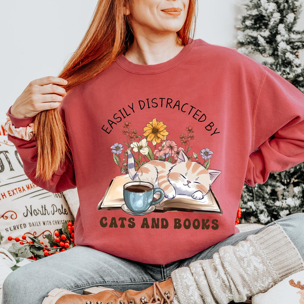Easily Distracted by Cats and Books graphic sweatshirt featuring Book Lover Cat Crewneck