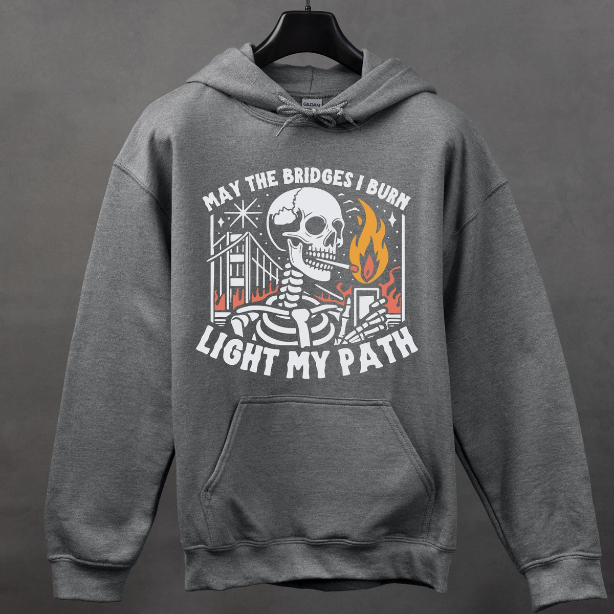 May the Bridges I Burn Light My Path graphic hoodie featuring Funny Skeleton Graphic Sweatshirt in Dark Heather