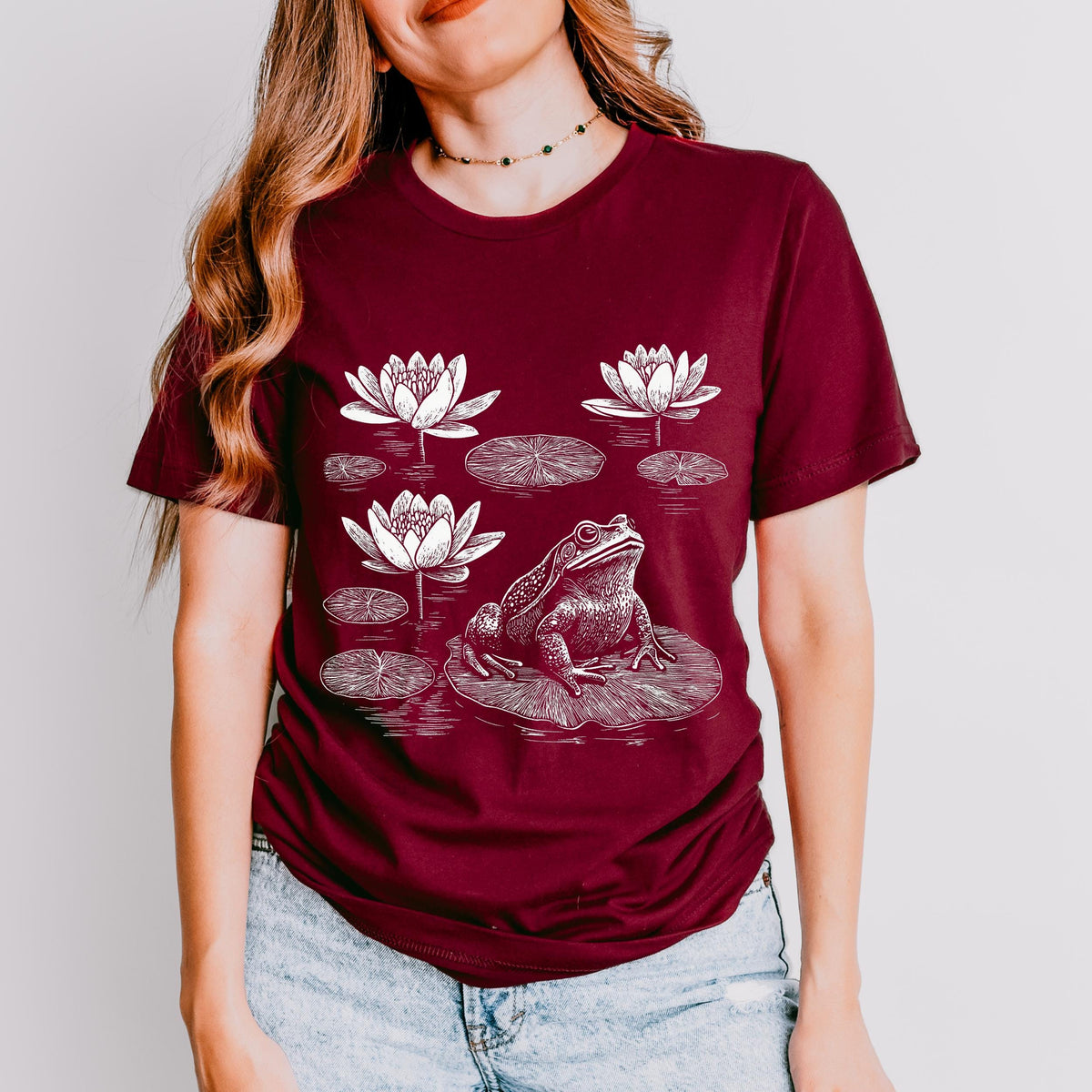 Frog graphic shirt featuring Linocut Frog & Water Lily Graphic Tee