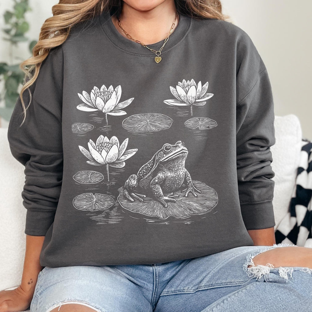 Frog graphic sweatshirt featuring Linocut Frog & Water Lily Crewneck