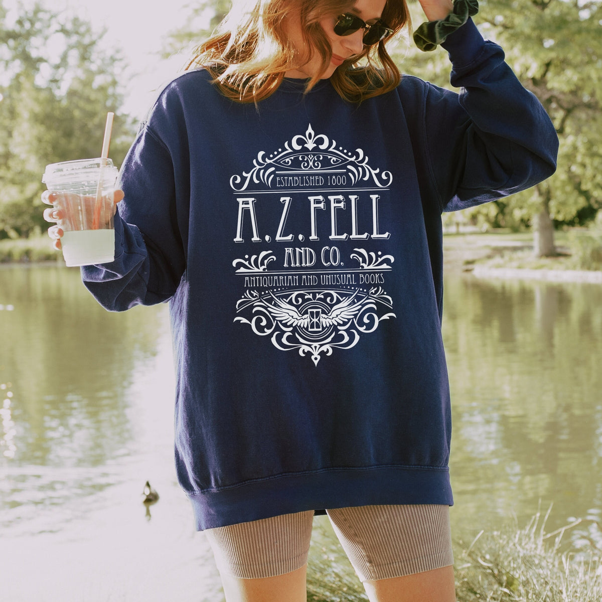 A.Z. Fell and Co long sleeve graphic shirt featuring Good Omens Aziraphale Comfort Colors Tee