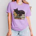 Black Cat Book Lover graphic shirt featuring Floral Book Stack Graphic Tee