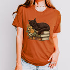 Black Cat Book Lover graphic shirt featuring Floral Book Stack Graphic Tee