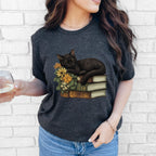 Black Cat Book Lover graphic shirt featuring Floral Book Stack Graphic Tee