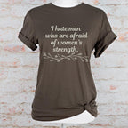 I Hate Men Who Are Afraid of Women’s Strength graphic shirt featuring Feminist Graphic Tee