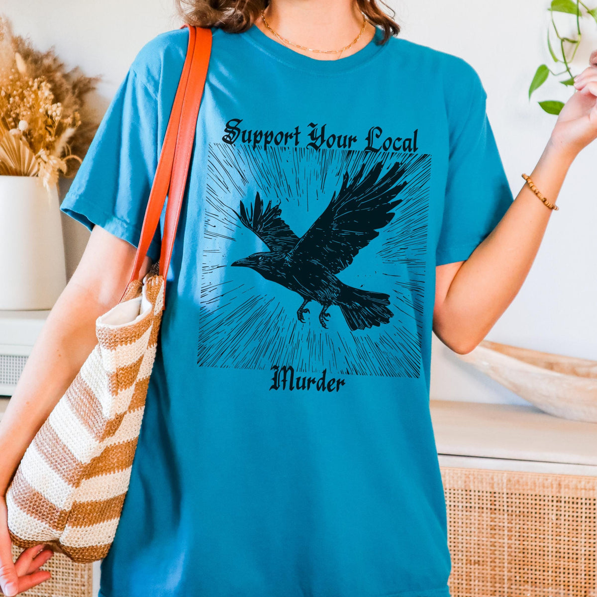Support Your Local Murder graphic shirt featuring Crow Graphic Tee