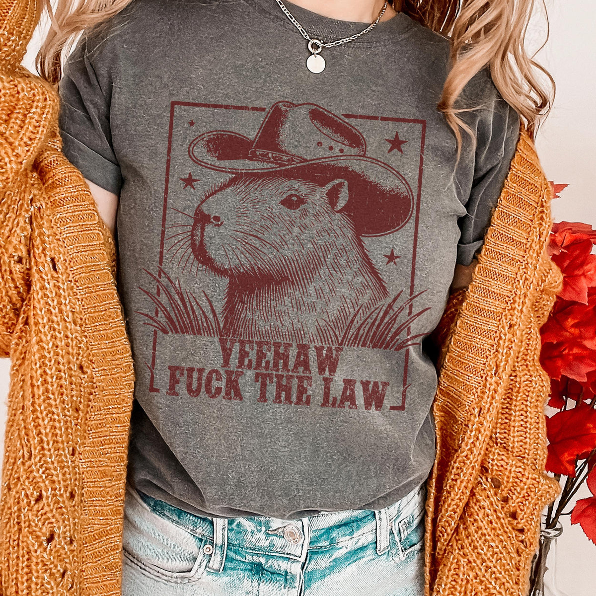 Yeehaw Fuck the Law Capybara graphic shirt featuring Funny Western Animal Graphic Tee