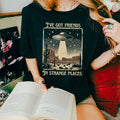 I’ve Got Friends in Strange Places graphic shirt featuring Vintage UFO Alien in Black