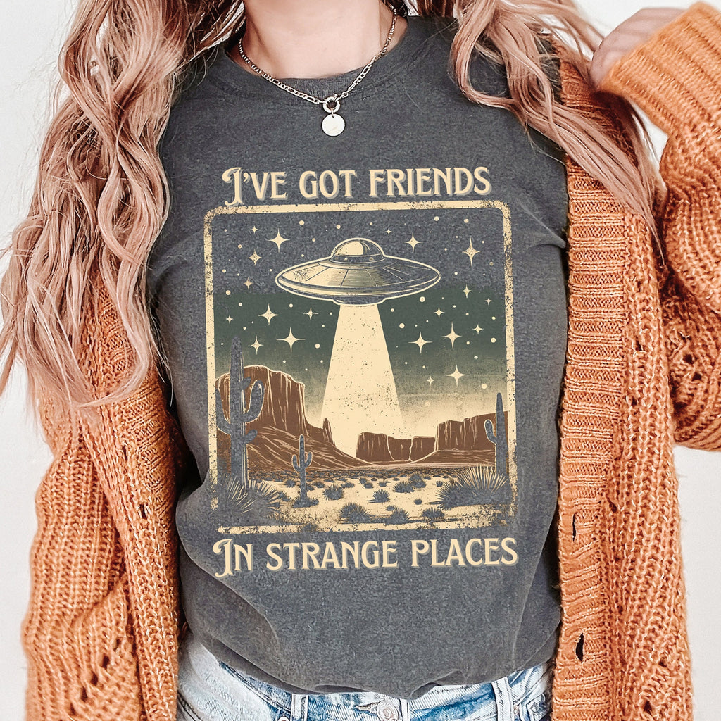I’ve Got Friends in Strange Places graphic shirt featuring Vintage UFO Alien