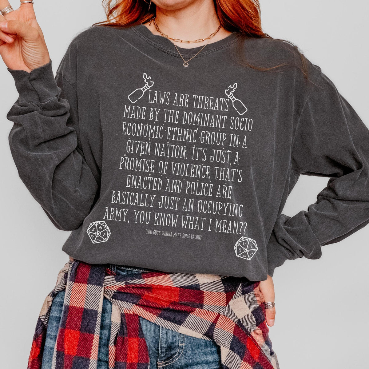 Laws Are Threats long sleeve graphic shirt featuring Bud Cubby Anti-Establishment Quote in Black