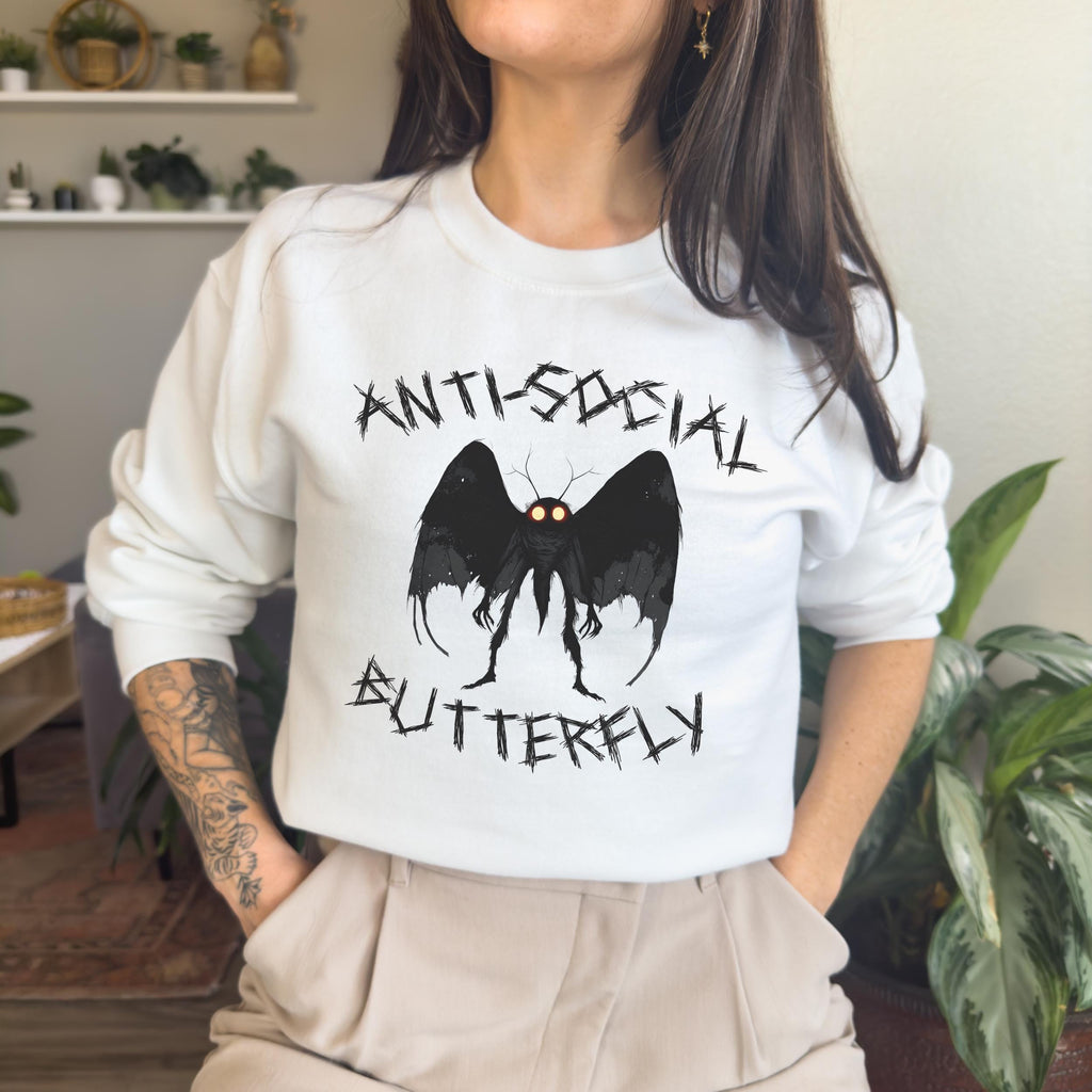 Anti-Social Butterfly Mothman graphic sweatshirt featuring Cryptid Humor in Antique Cherry Red
