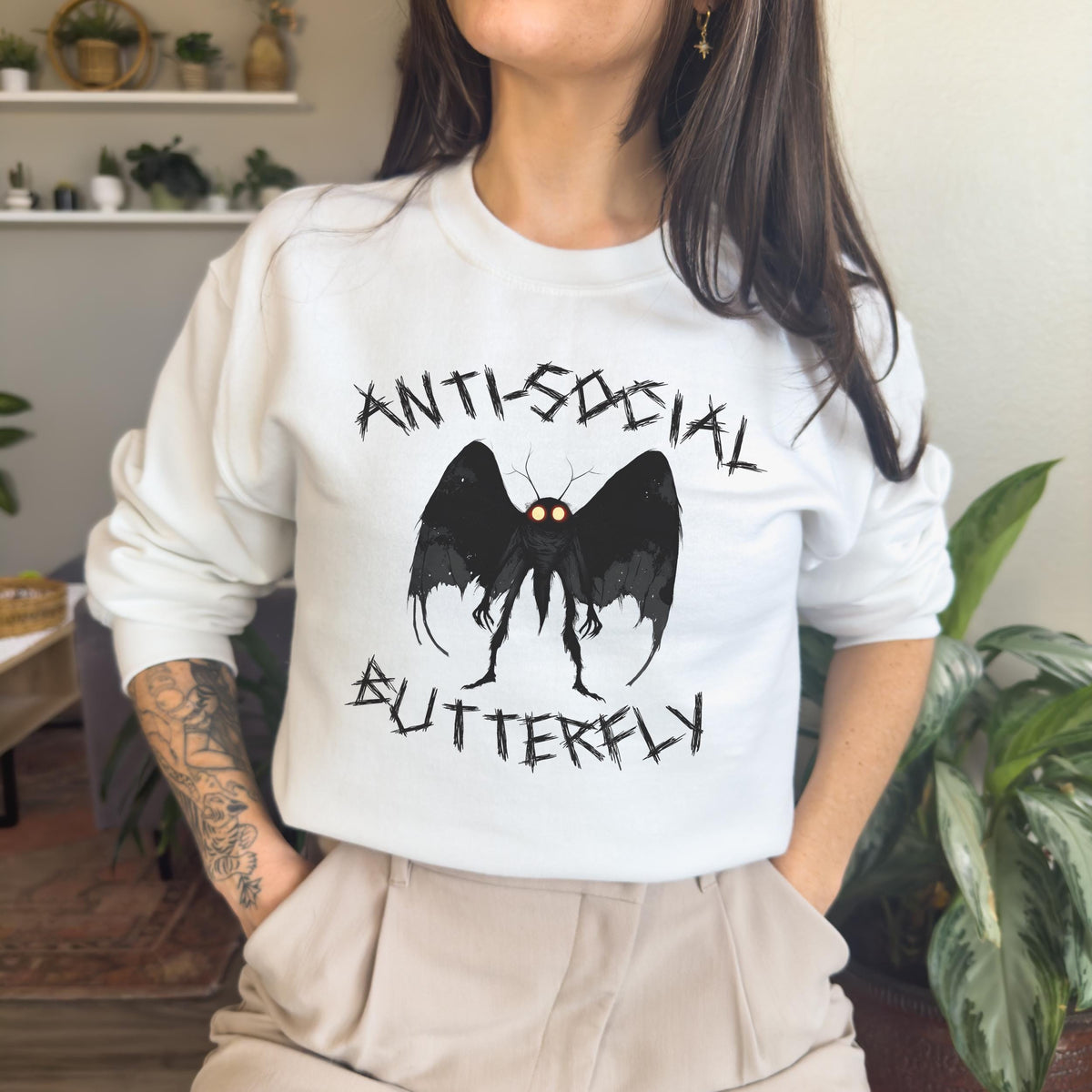 Anti-Social Butterfly Mothman graphic sweatshirt featuring Cryptid Humor in Antique Cherry Red