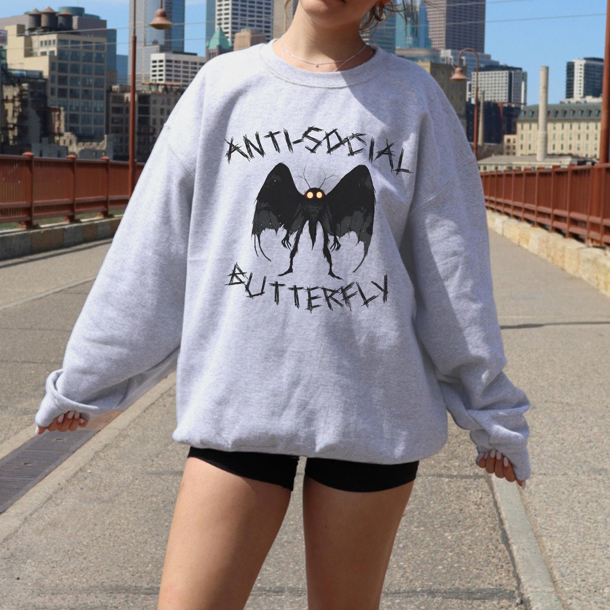 Anti-Social Butterfly Mothman graphic sweatshirt featuring Cryptid Humor