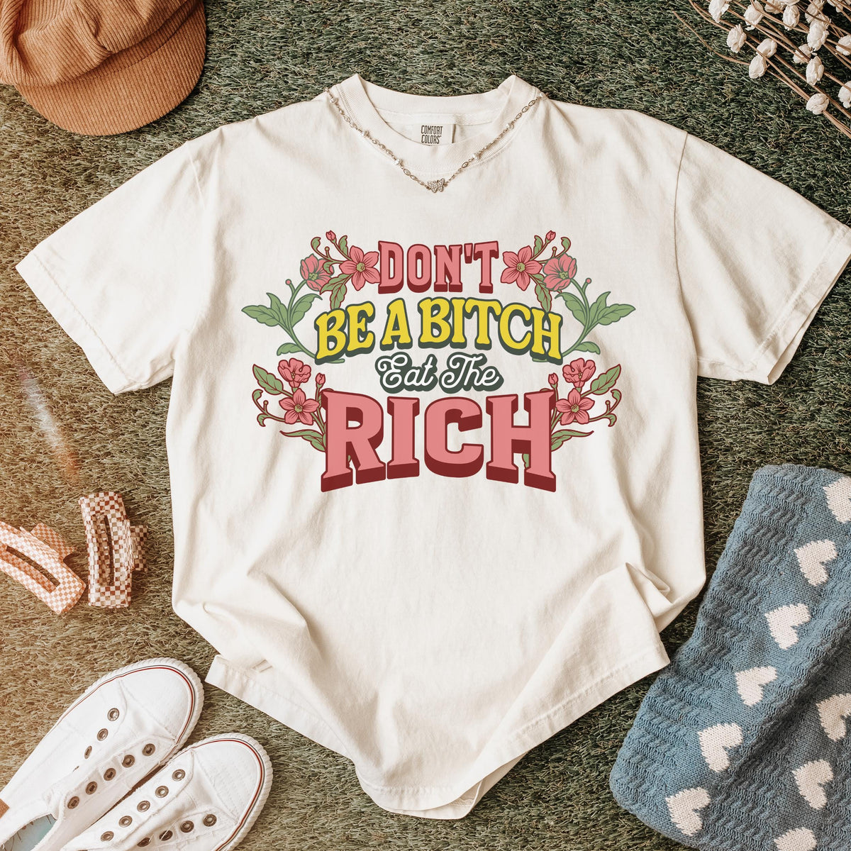 Don’t Be a Bitch, Eat the Rich graphic shirt featuring Floral Anti-Capitalist in Black
