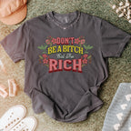 Don’t Be a Bitch, Eat the Rich graphic shirt featuring Floral Anti-Capitalist