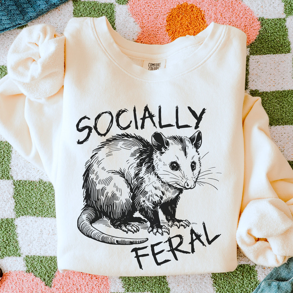 Socially Feral graphic sweatshirt featuring Funny Possum in Black