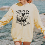 Socially Feral graphic sweatshirt featuring Funny Possum