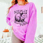 Socially Feral graphic sweatshirt featuring Funny Possum