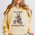 Y’all Go Ahead, I’m Gonna Dilly Dally graphic sweatshirt featuring Funny Bear in Butter