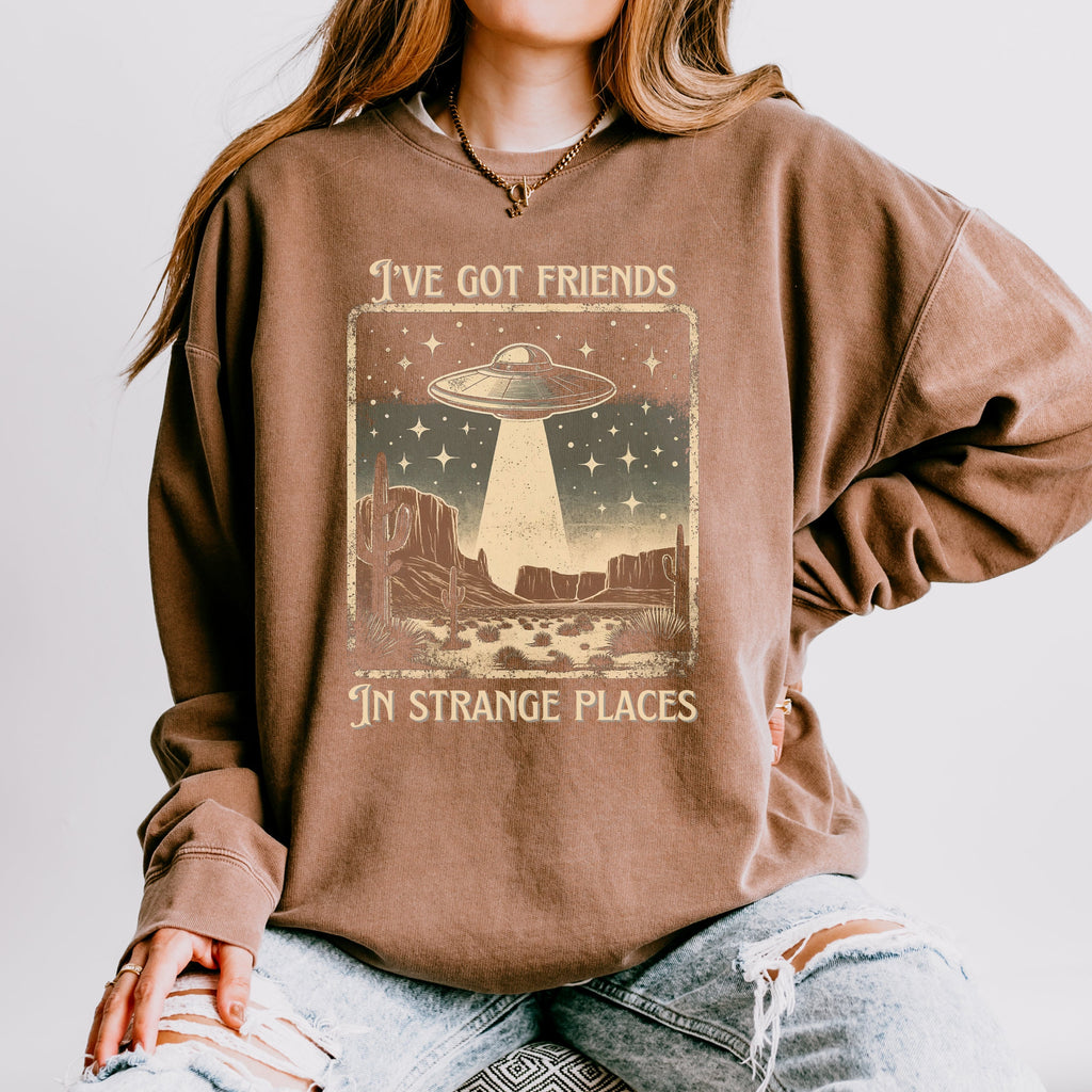 I’ve Got Friends in Strange Places graphic sweatshirt featuring Retro UFO Desert