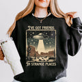 I’ve Got Friends in Strange Places graphic sweatshirt featuring Retro UFO Desert in Black
