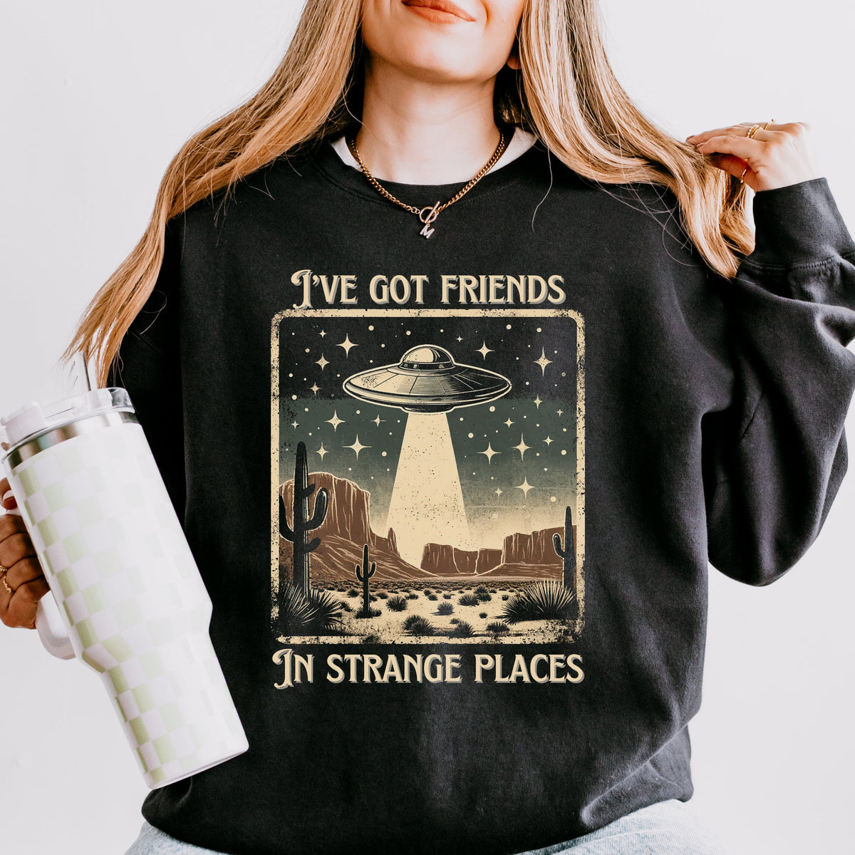 I’ve Got Friends in Strange Places graphic sweatshirt featuring Retro UFO Desert in Black