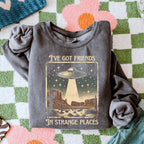I’ve Got Friends in Strange Places graphic sweatshirt featuring Retro UFO Desert