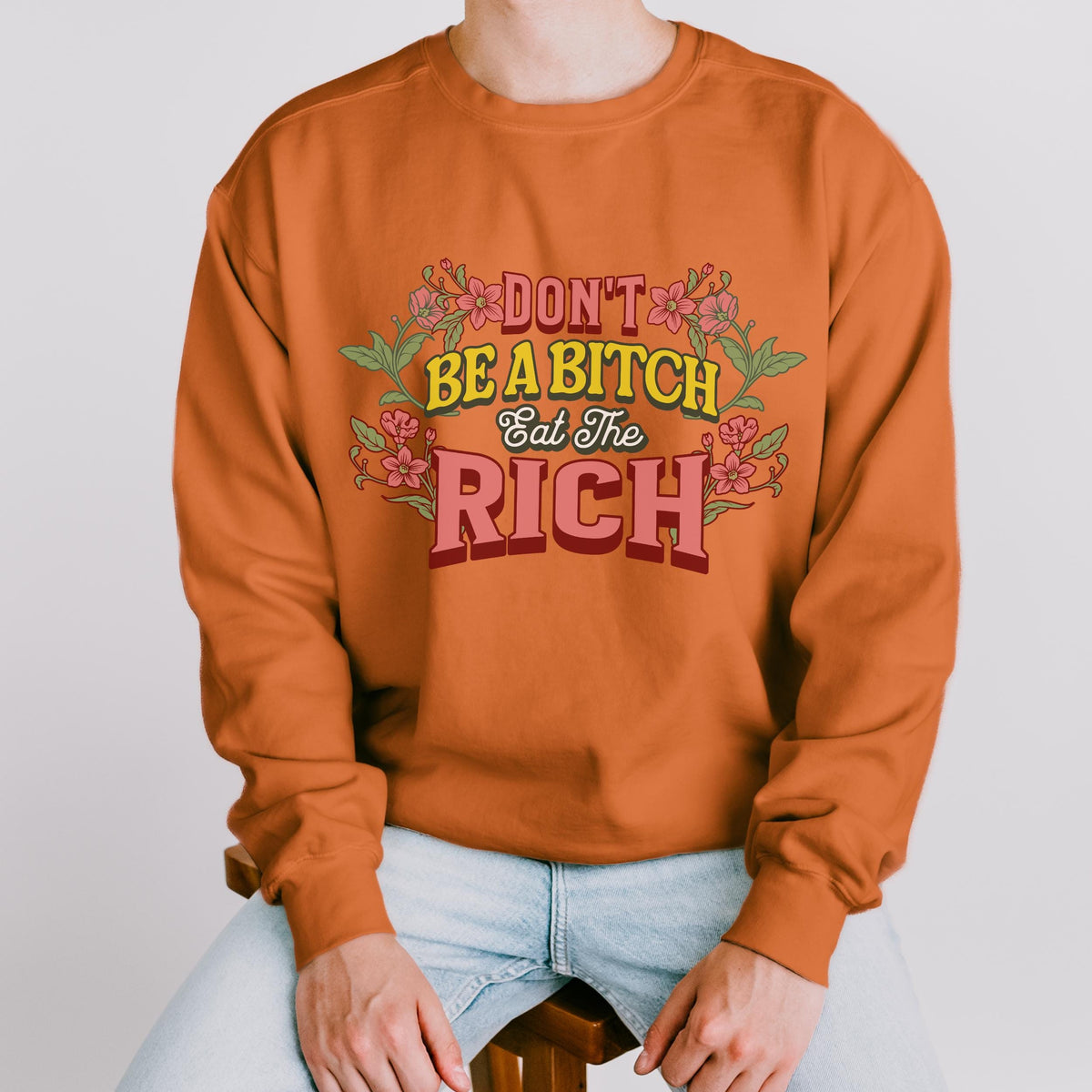 Don’t Be a Bitch, Eat the Rich graphic sweatshirt featuring Floral Anti-Capitalist